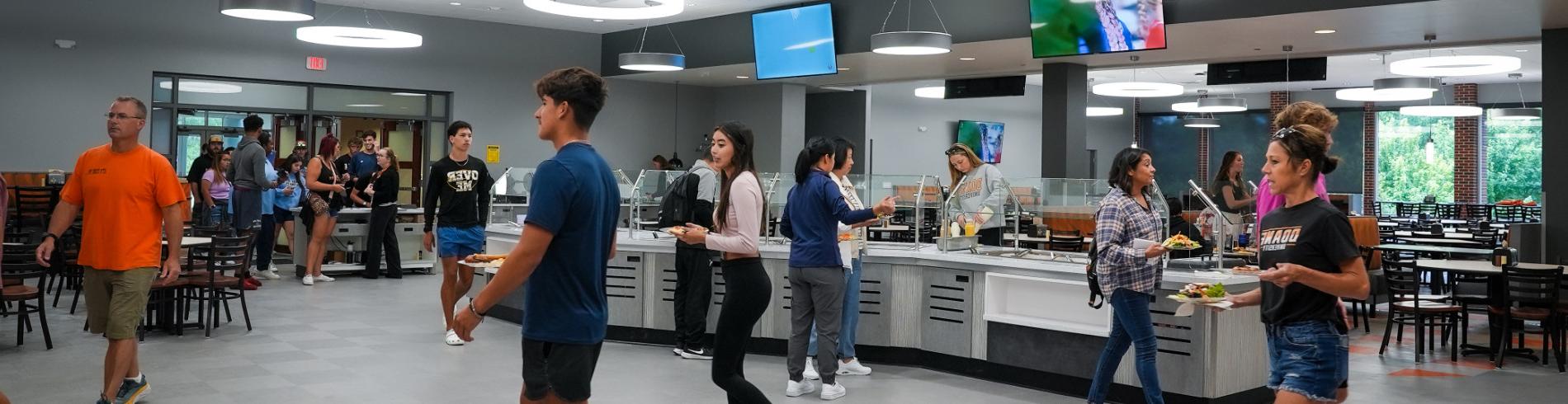 Students having lunch in the cafeteria